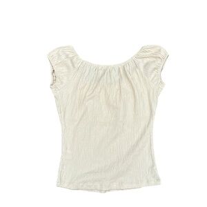 A very cute cream top!